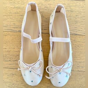 Nude mesh and rhinestone ballet flats. Just like the Loeffler Randall version